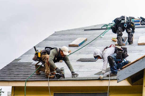 Professional Storm Damage Roof Repair technician working in Fletcher, OK